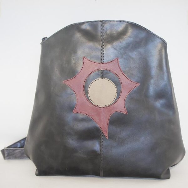Tienda online de artículos hechos a mano en cuero y piel. Artesanos del cuero. Mochila de cuero con Eclipse DSC0391 Mochila de piel gris