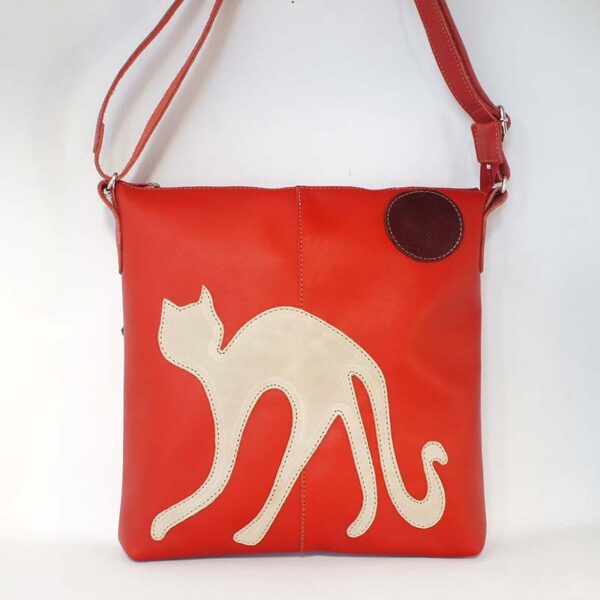 bolso bandolera de piel rojo con gato