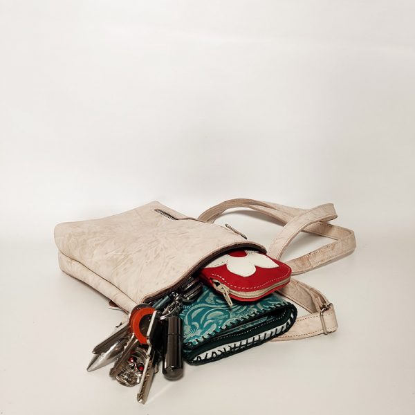 bolso mini de piel crudo