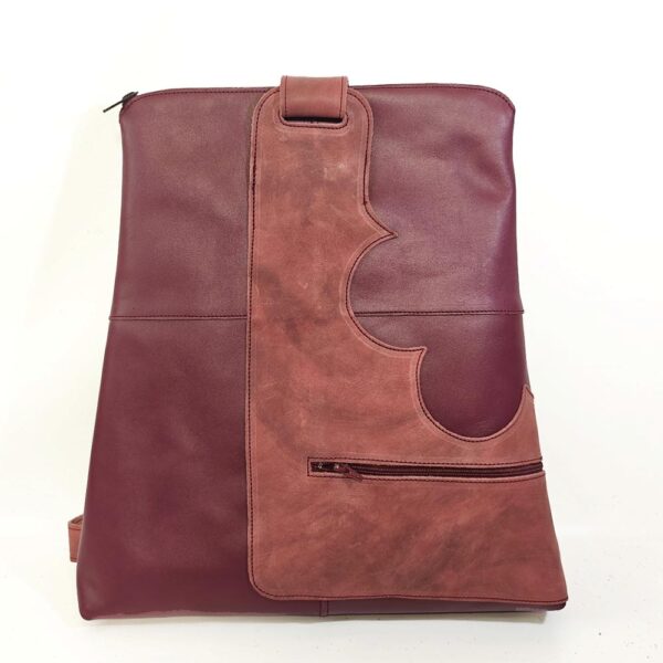 Tienda online de artículos hechos a mano en cuero y piel. Artesanos del cuero. Moncayo mochila antirrobo de piel IMG 20260918 105238 Mochila de piel granate