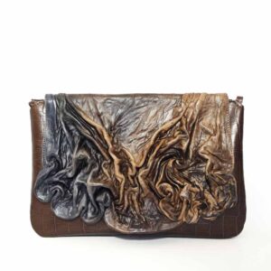 Bolso único de mano en piel
