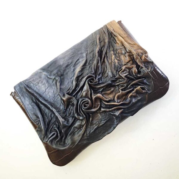 Bolso único de mano en piel