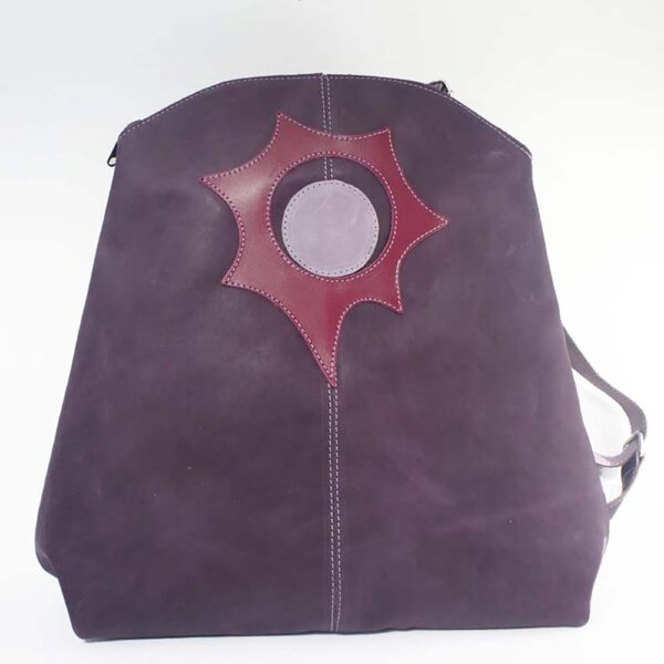 Mochila de piel morada