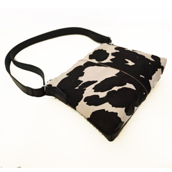 Bolso de piel negro/pelo print vaca