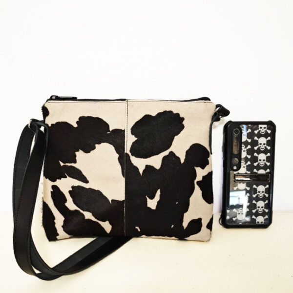 Bolso de piel negro/pelo print vaca